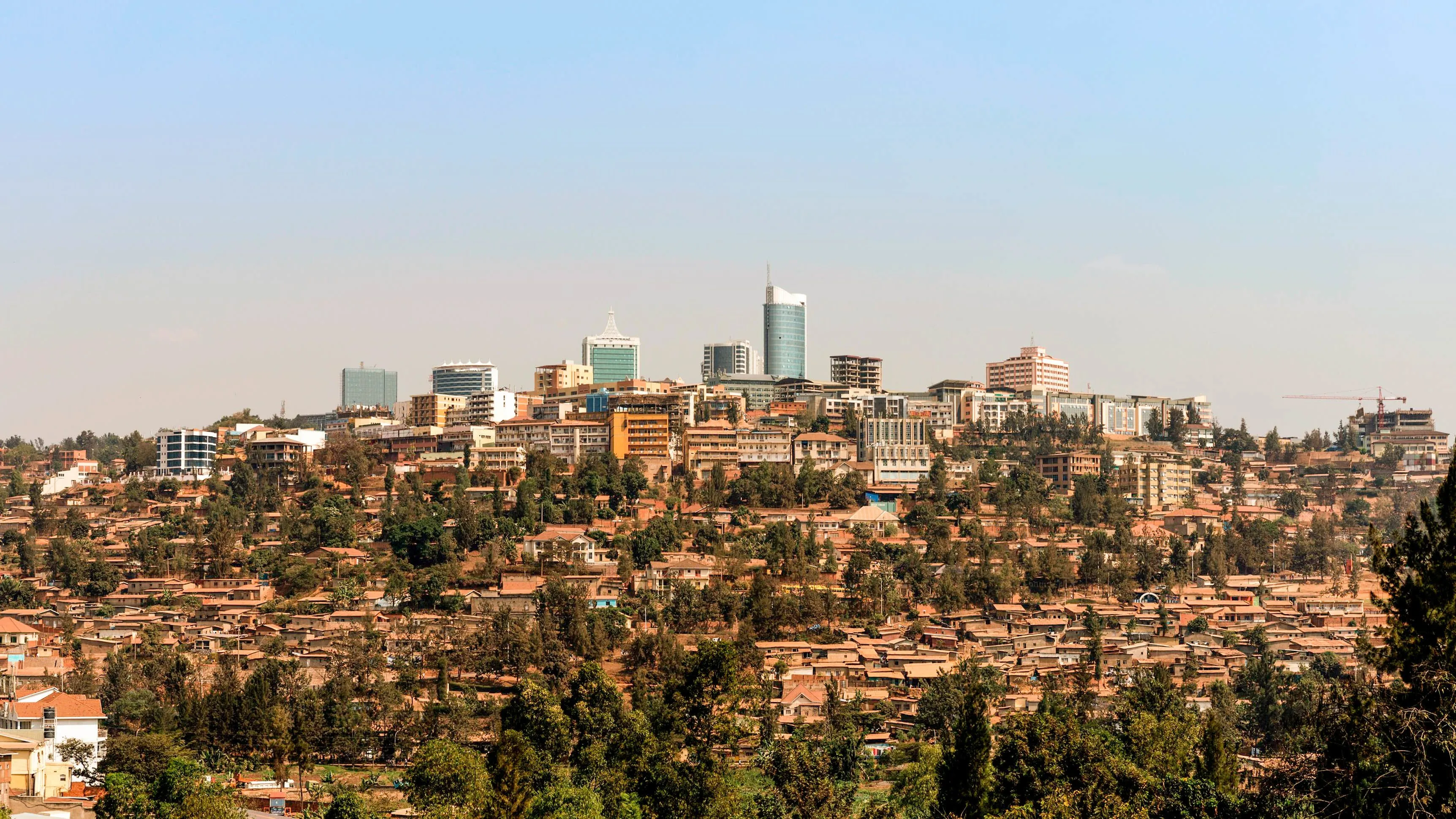 Kigali skyline at golden hour — StackForgeAI HQ